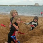 Digging holes on Elie beach