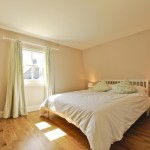 Bedroom with white bed