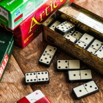 Dominos scattered around the box