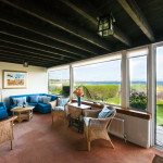 patio sitting area with windows