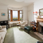 living room with large double window